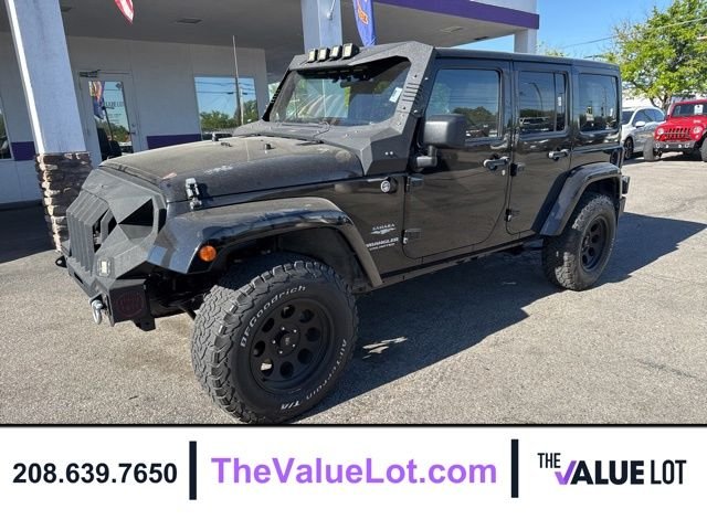 Used 2011 Black Jeep Unlimited Sahara image 8
