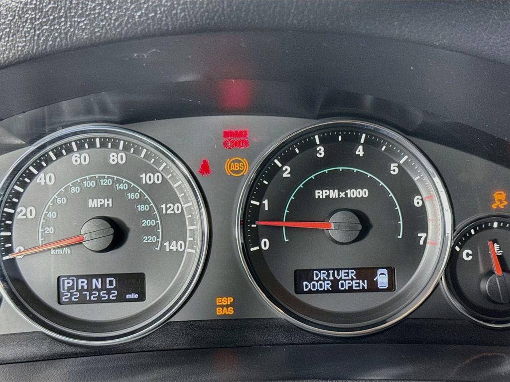 Used 2010 Light Graystone Pearlcoat Jeep Laredo image 15