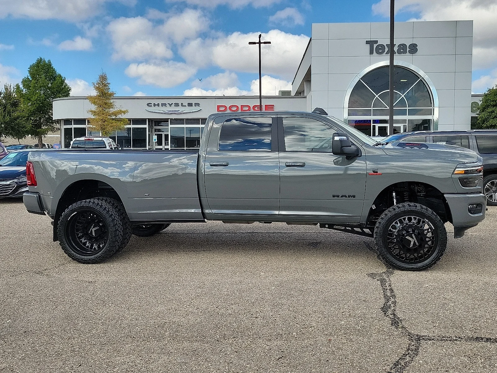 New 2026 Ceramic Gray Ram LARAMIE CREW CAB 4X4 8