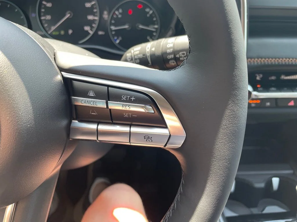 New 2026 Machine Gray Metallic Mazda Premium Plus AWD image 22