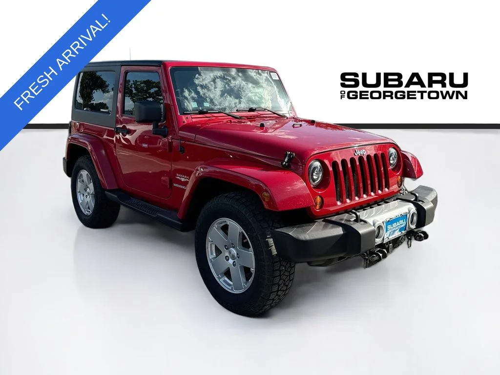 Used 2011 Red Jeep Sahara image 1