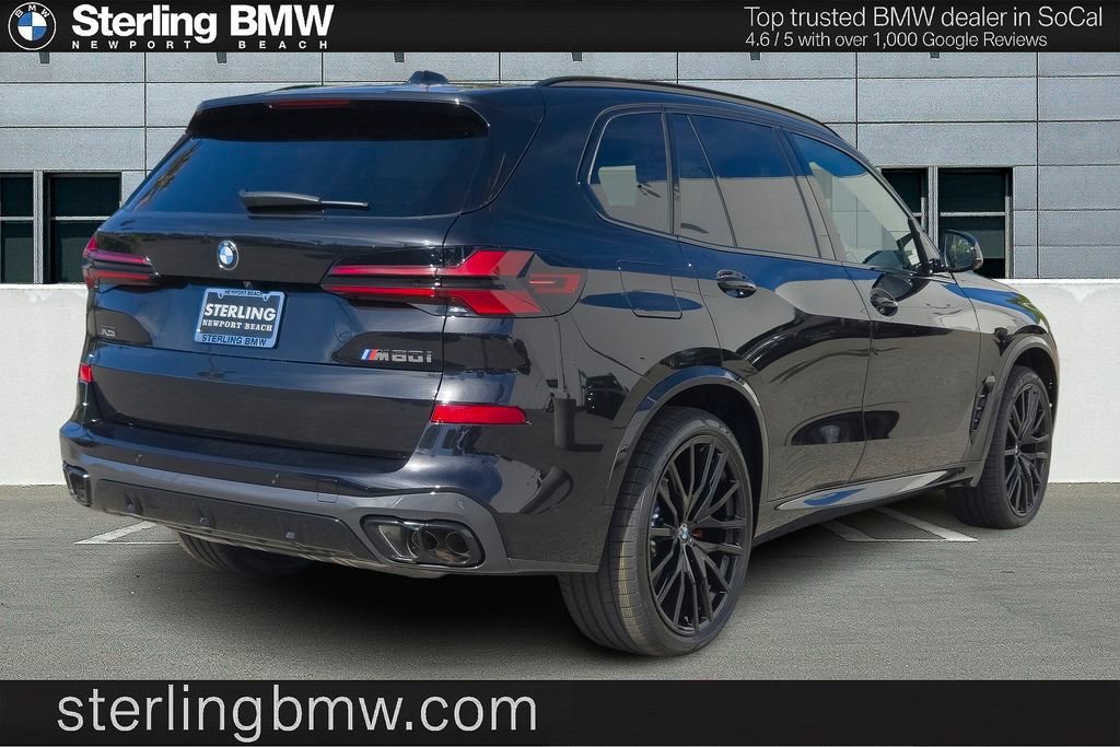 New 2026 Black Sapphire Metallic BMW M60i image 16