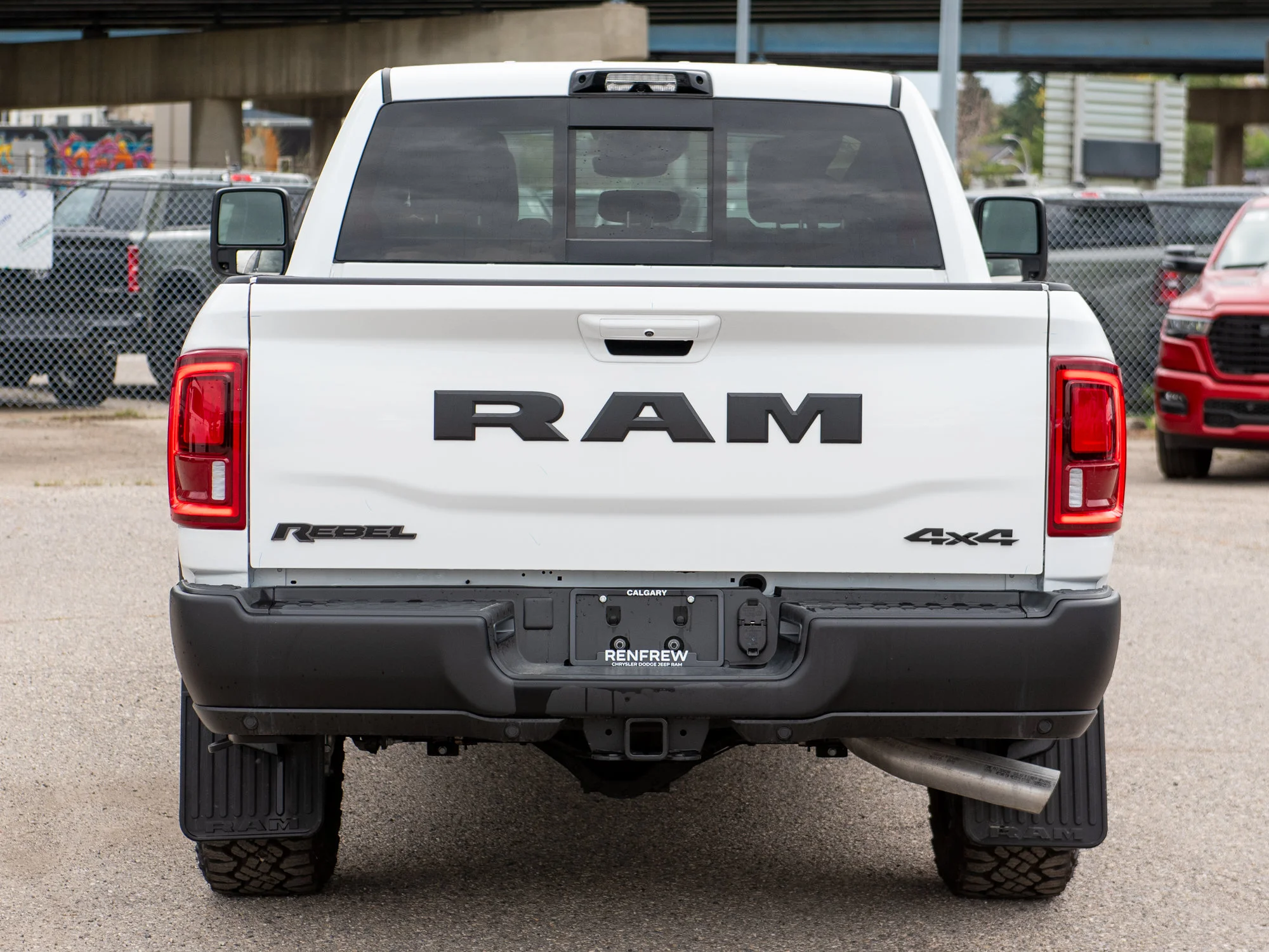 New 2026 White RAM Rebel* Crew Cab 4x4, 6.7L Cummins, Sunroof, 34 Inch A/T Tires, Passenger Screen image 6