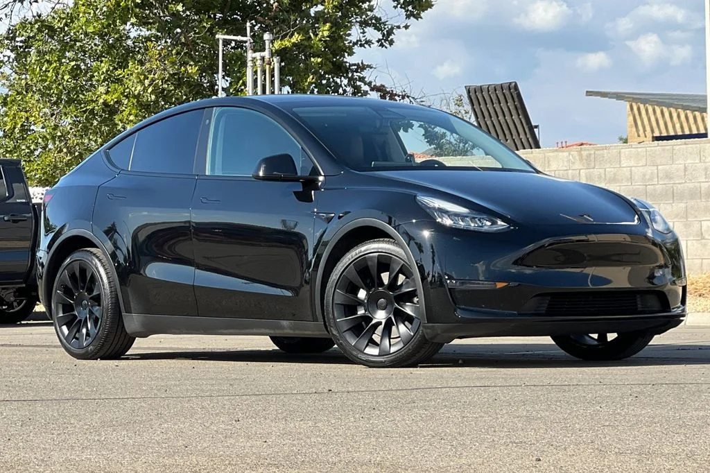 Used 2021 Tesla Model Y Long Range with VIN 5YJYGDEE0MF089635 for sale in Hanford, CA