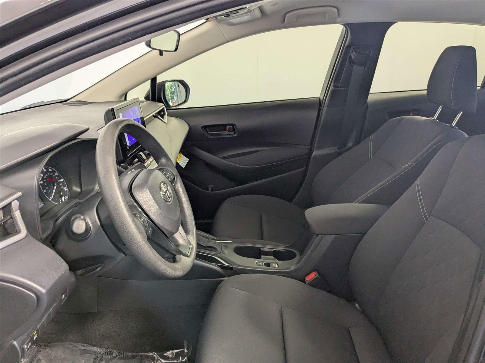 Certified Used 2024 Midnight Black Metallic Toyota Hybrid LE image 13