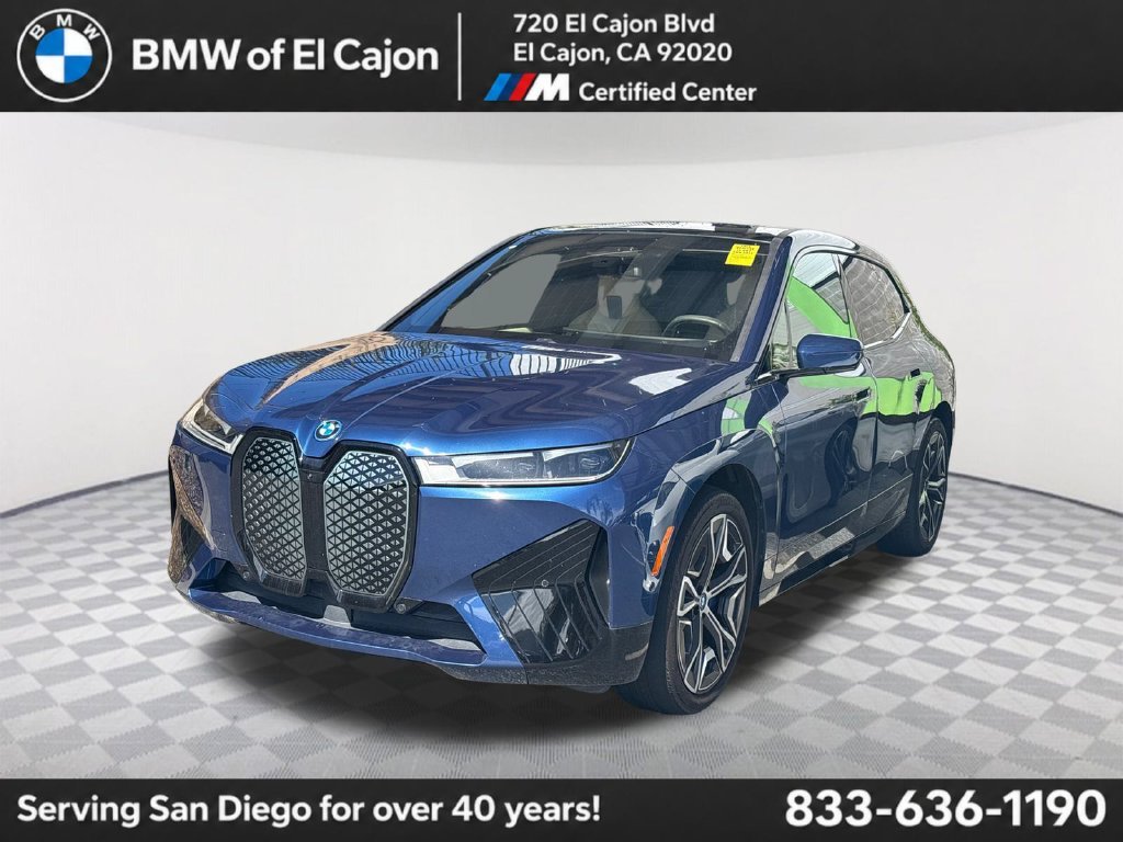 Used 2022 Blue BMW xDrive50 image 1