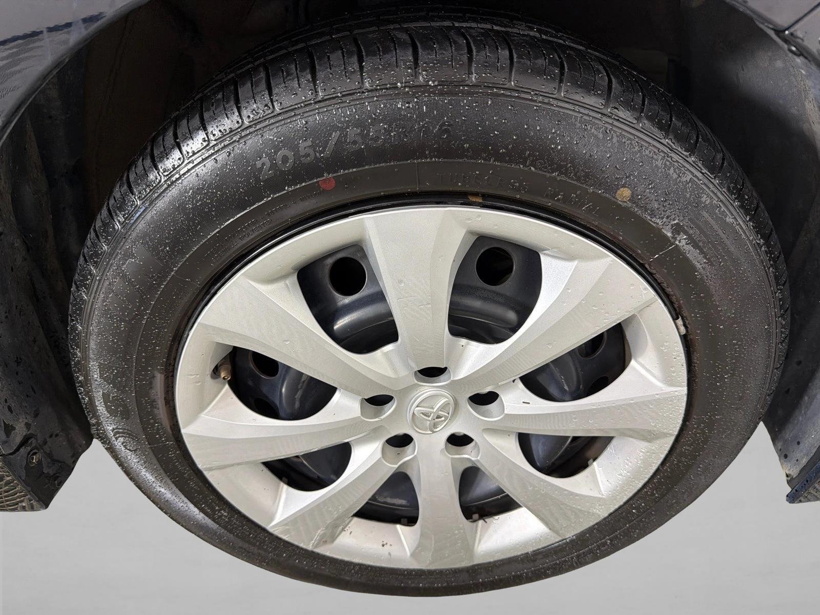 Used 2024 Midnight Black Metallic Toyota LE image 12