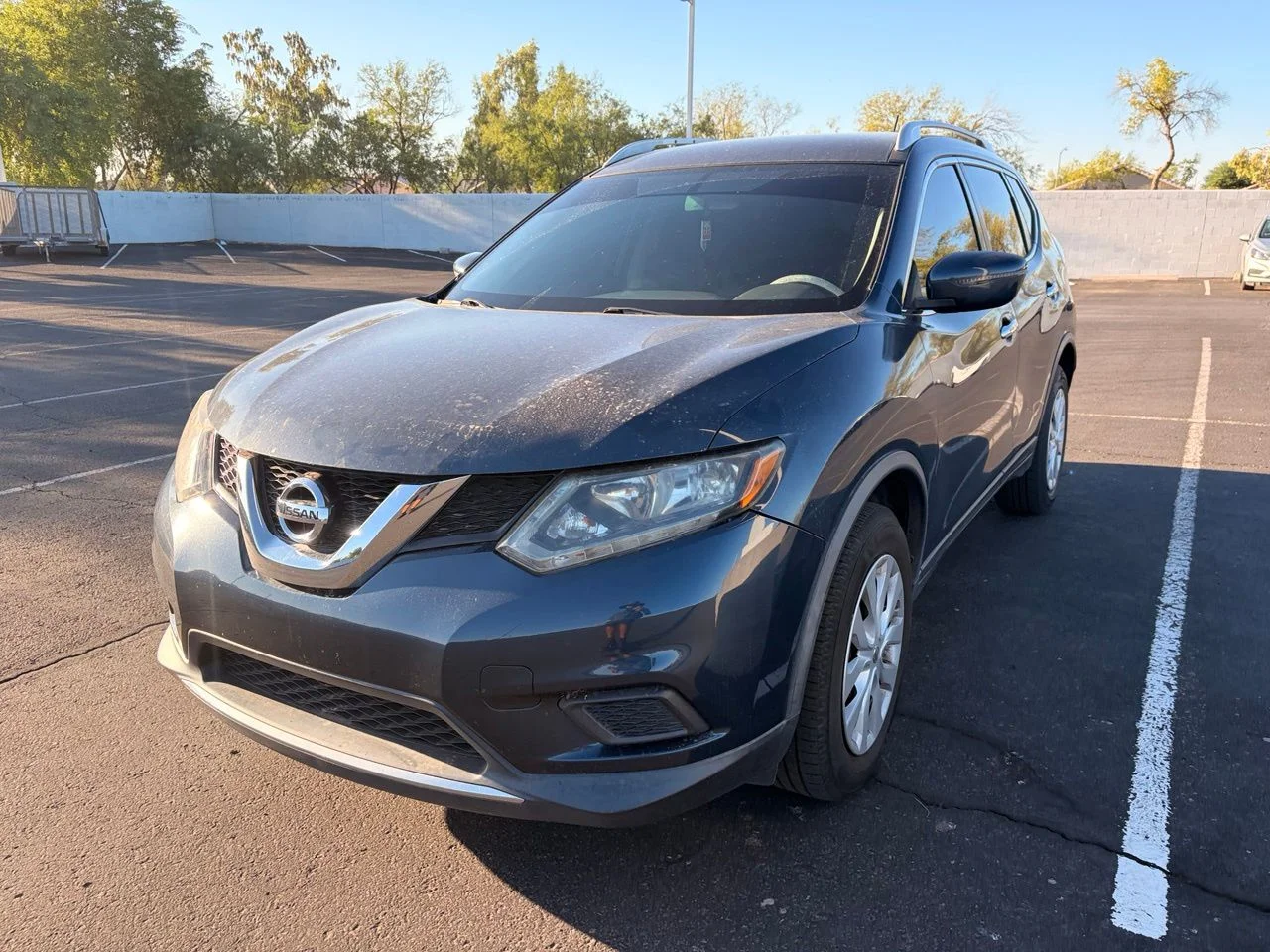Used 2016 Arctic Blue Metallic Nissan S image 1