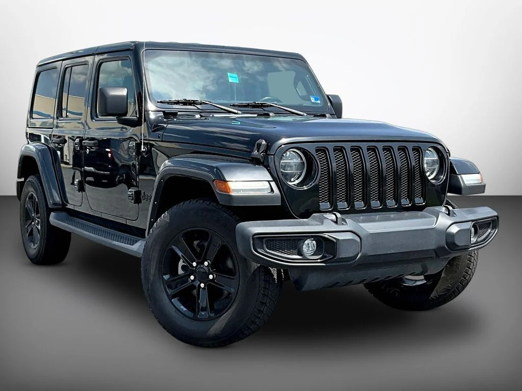 Used 2022 Black Jeep Unlimited Sahara Altitude image 1