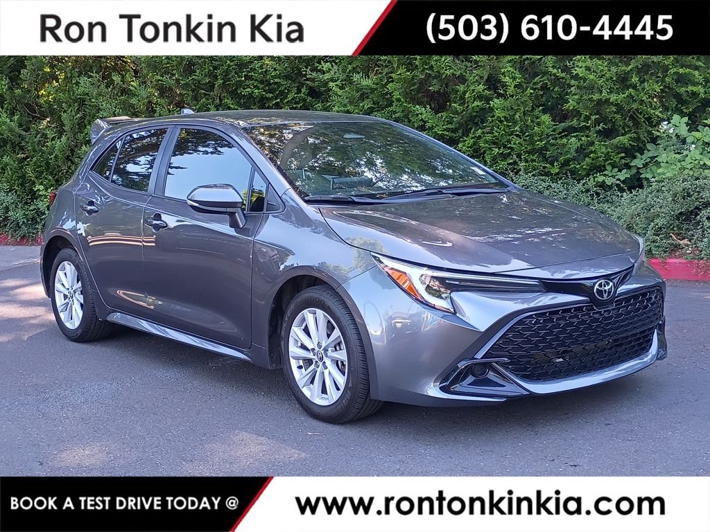 Used 2023 Magnetic Gray Metallic Toyota SE image 1