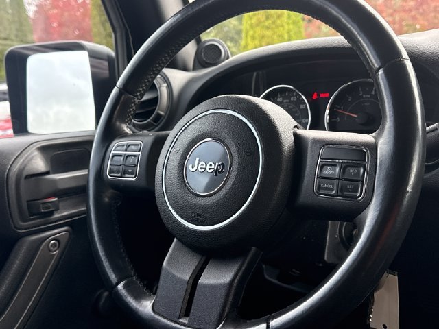 Used 2012 Black Clearcoat Jeep Unlimited Sport image 9