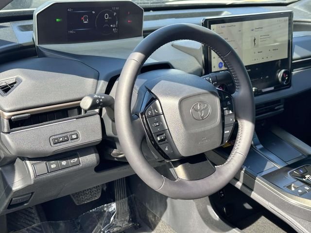 Used 2026 Toyota bZ XLE with VIN JTMBFAEB3TA002654 for sale in Leesburg, VA