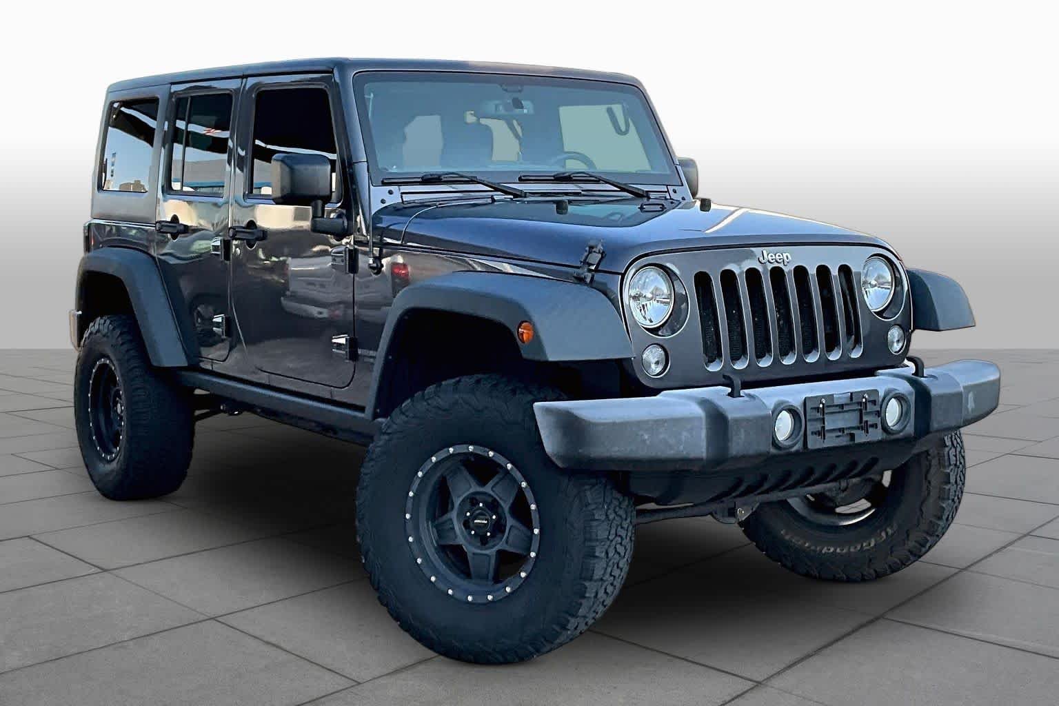 Used 2016 Granite Crystal Metallic Clearcoat Jeep Rubicon image 3