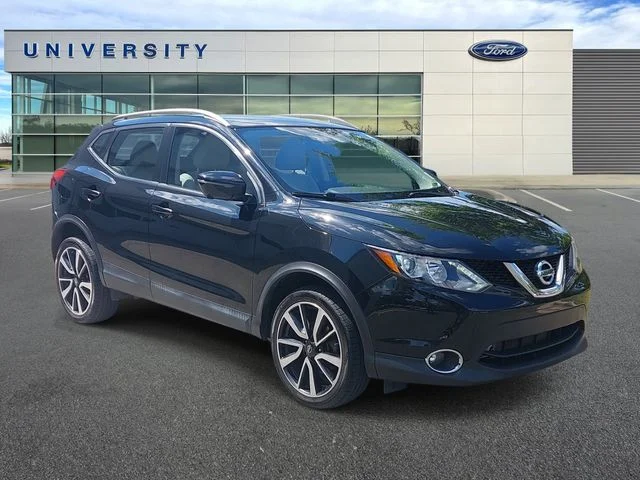 Used 2017 Black Nissan SL image 1