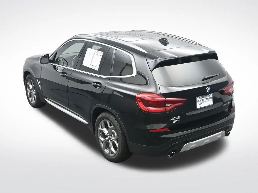 Used 2021 Black BMW xDrive30i image 29