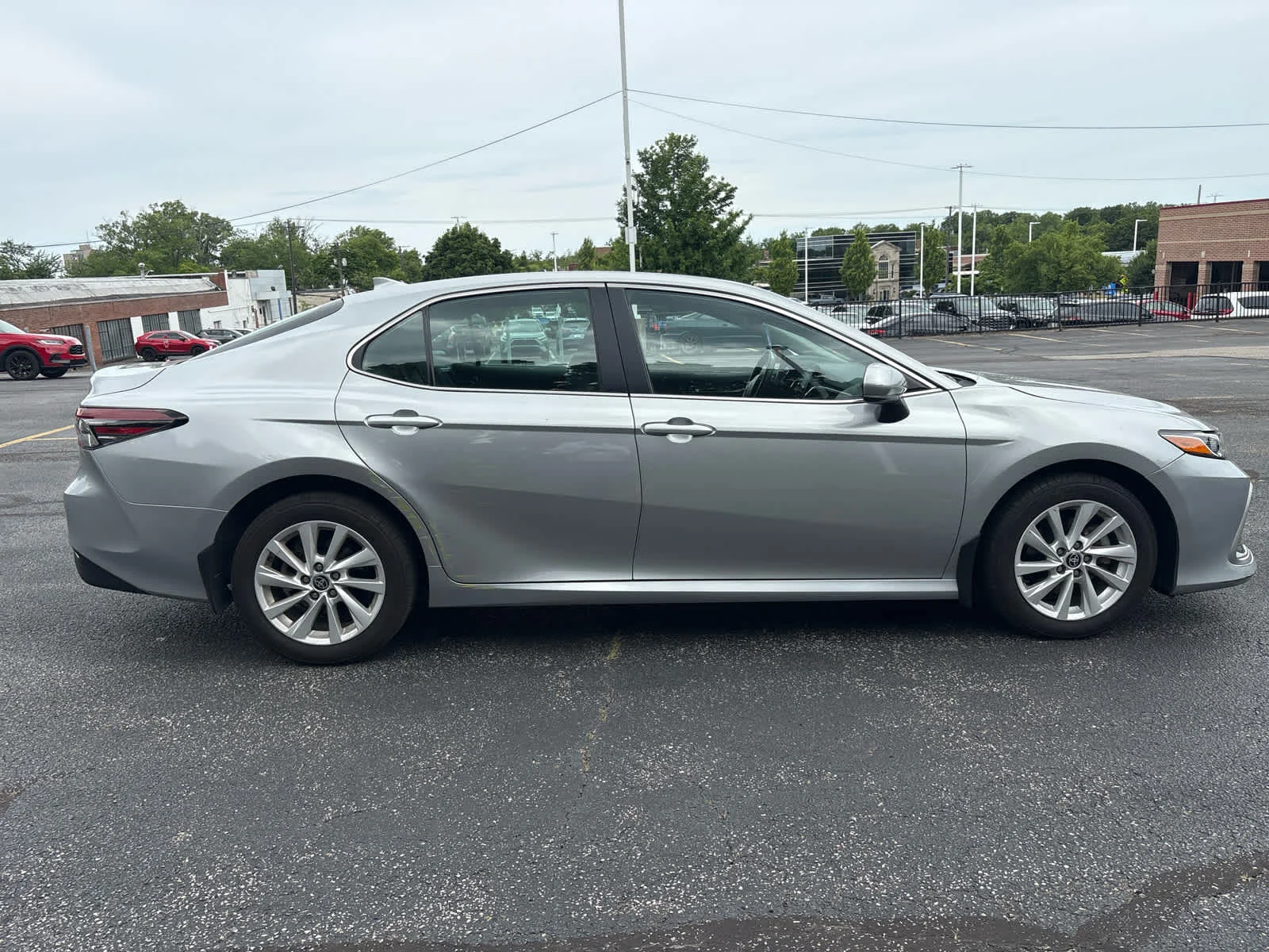 Used 2024 Celestial Silver Metallic Toyota LE image 9
