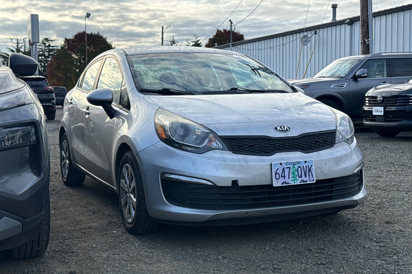 Used 2016 Bright Silver Metallic Kia LX image 2