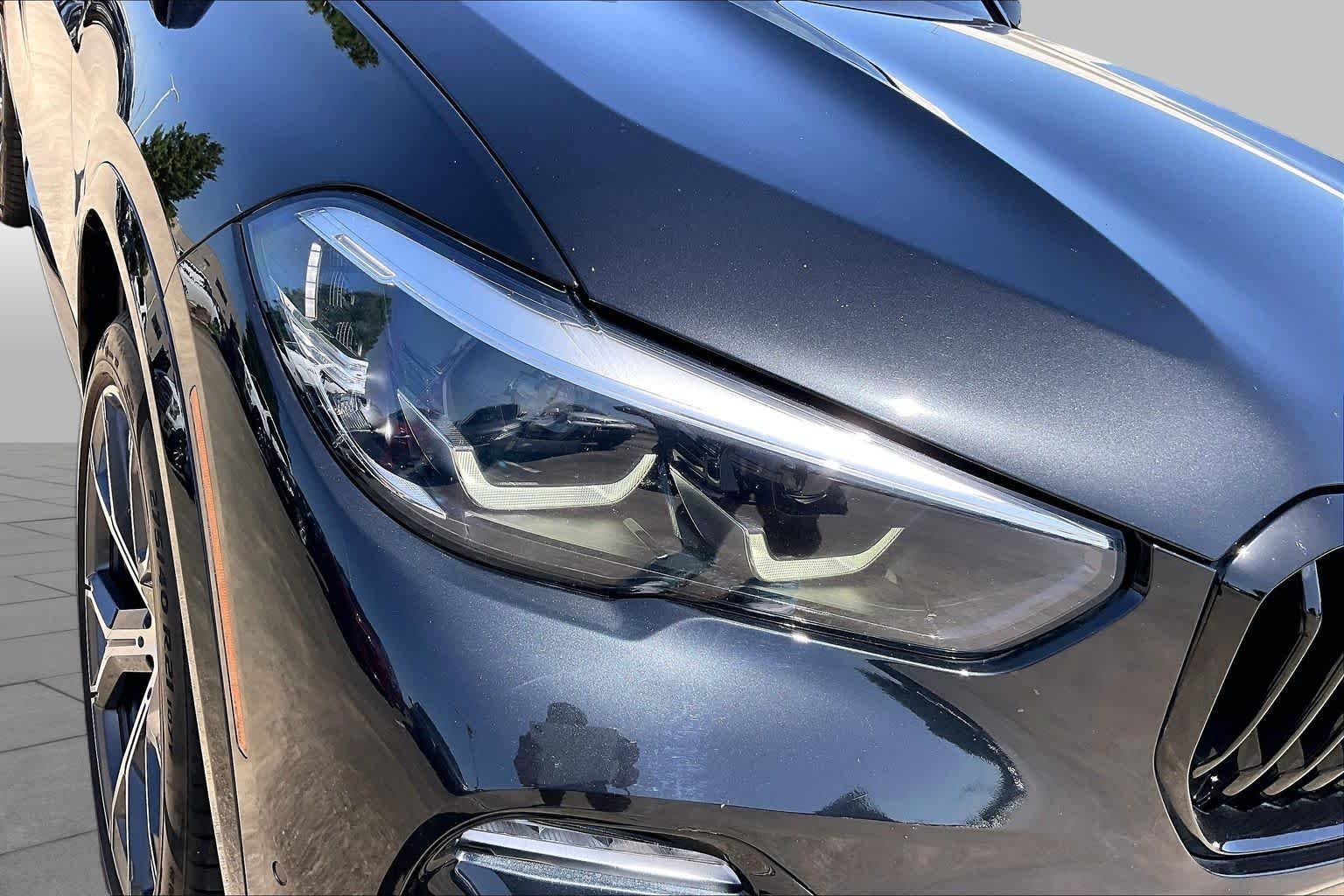 Used 2021 Black Sapphire Metallic BMW sDrive40i image 26