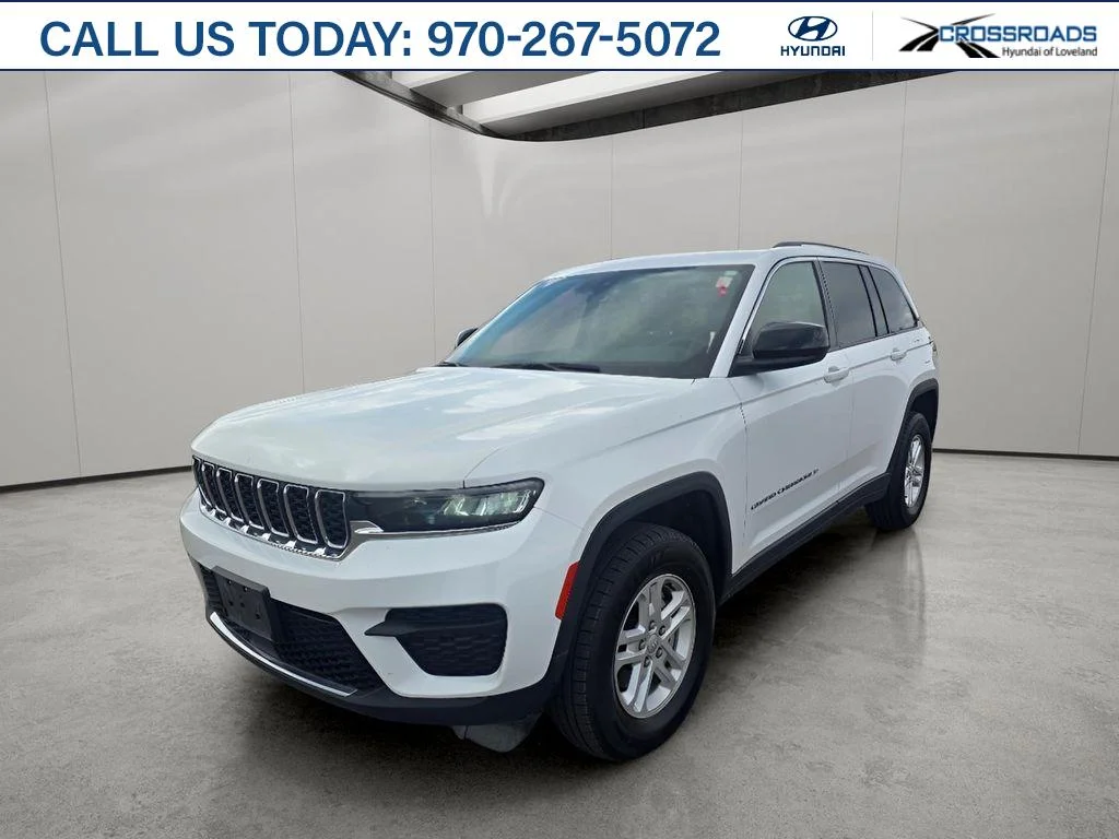Used 2024 Bright White Clearcoat Jeep Laredo image 1
