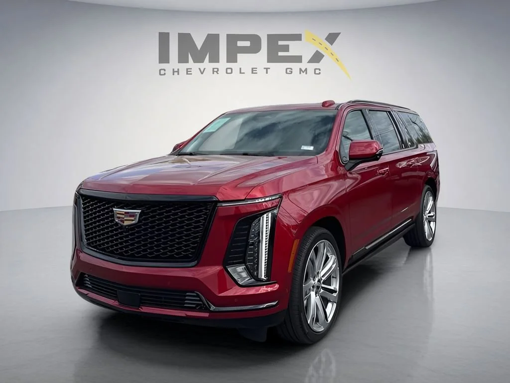 Used 2025 Radiant Red Tintcoat Cadillac Sport Platinum image 1