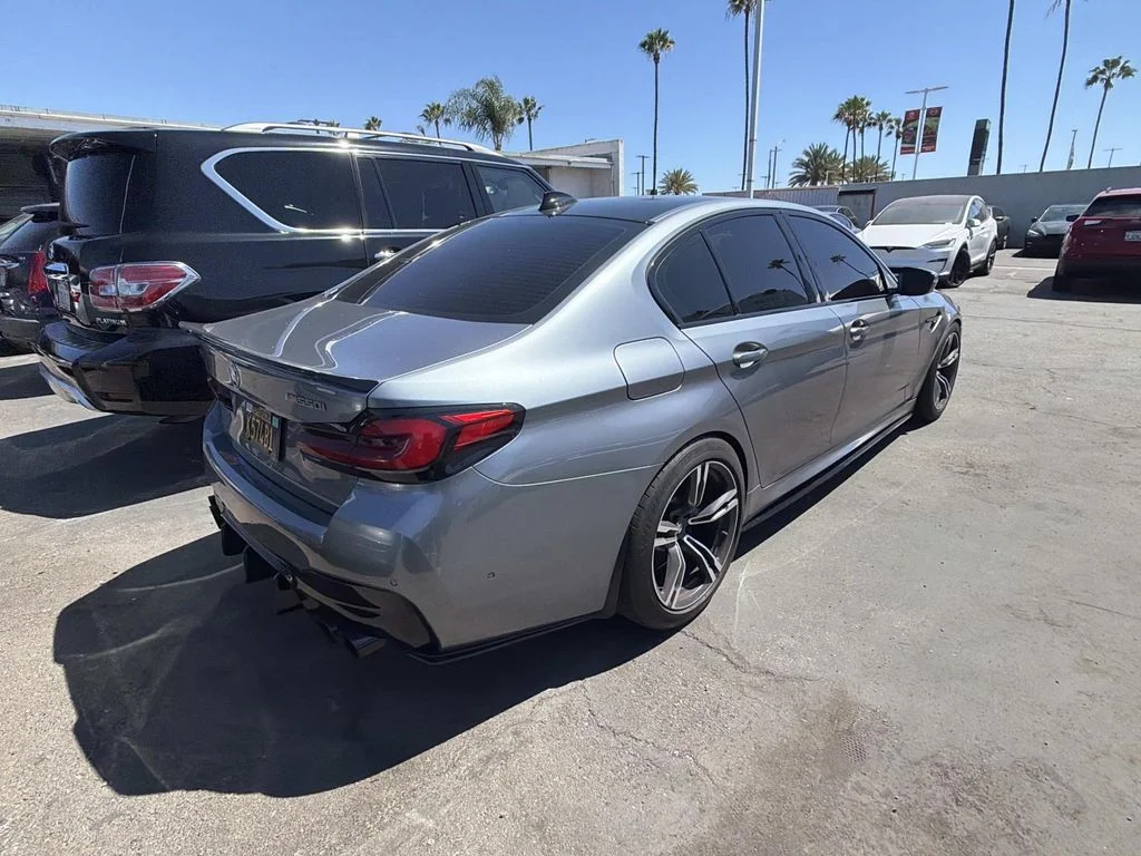 Used 2021 Bluestone Metallic BMW M550i xDrive image 5