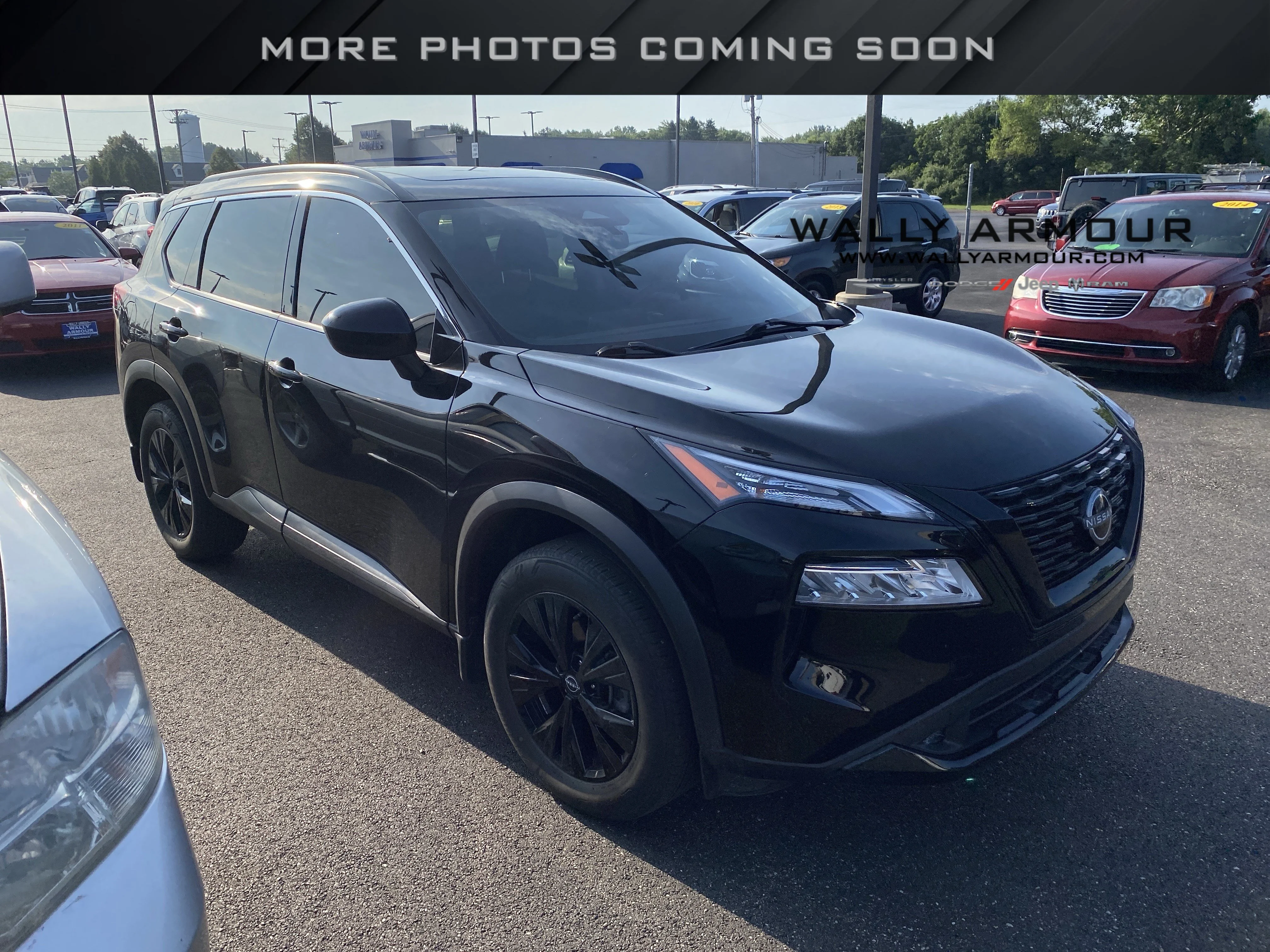 Used 2023 Super Black Nissan SV image 1