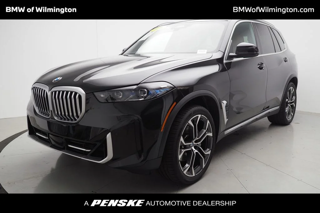 Certified Used 2026 Black Sapphire Metallic BMW xDrive40i image 1