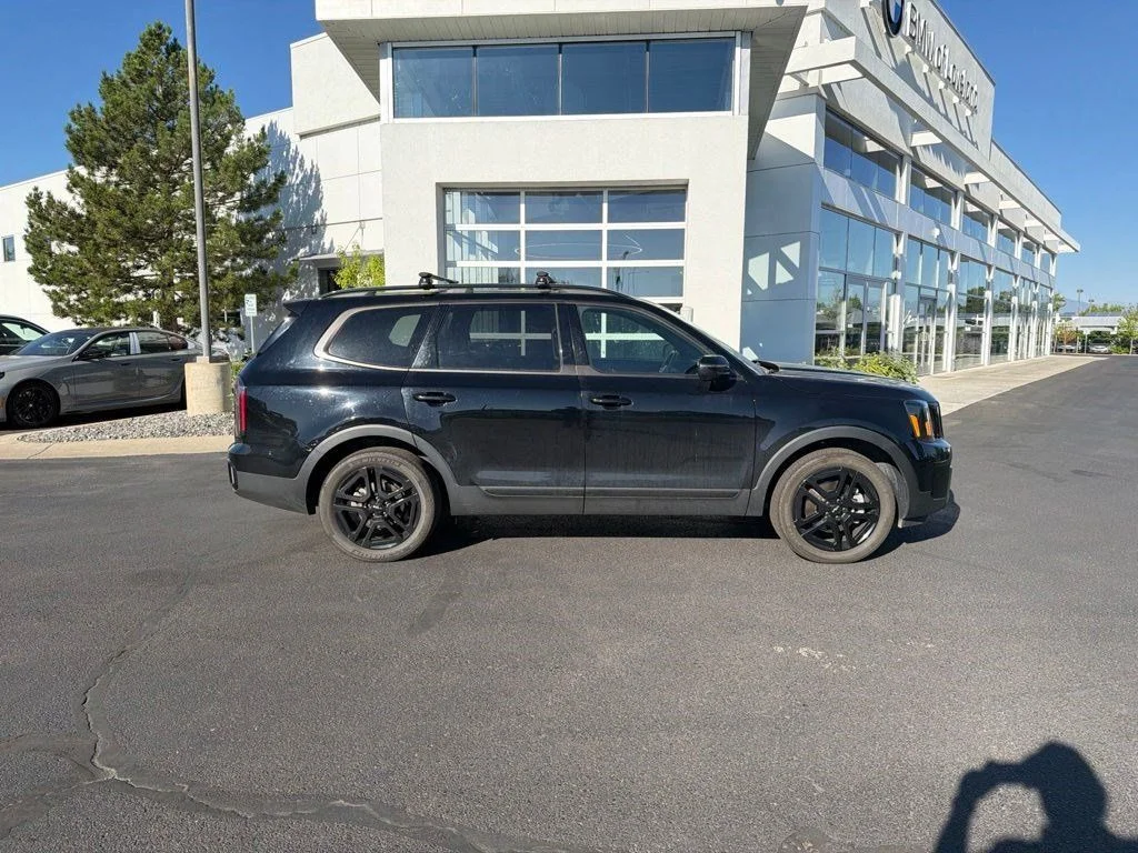 Used 2024 Ebony Black Kia EX X-Line image 6