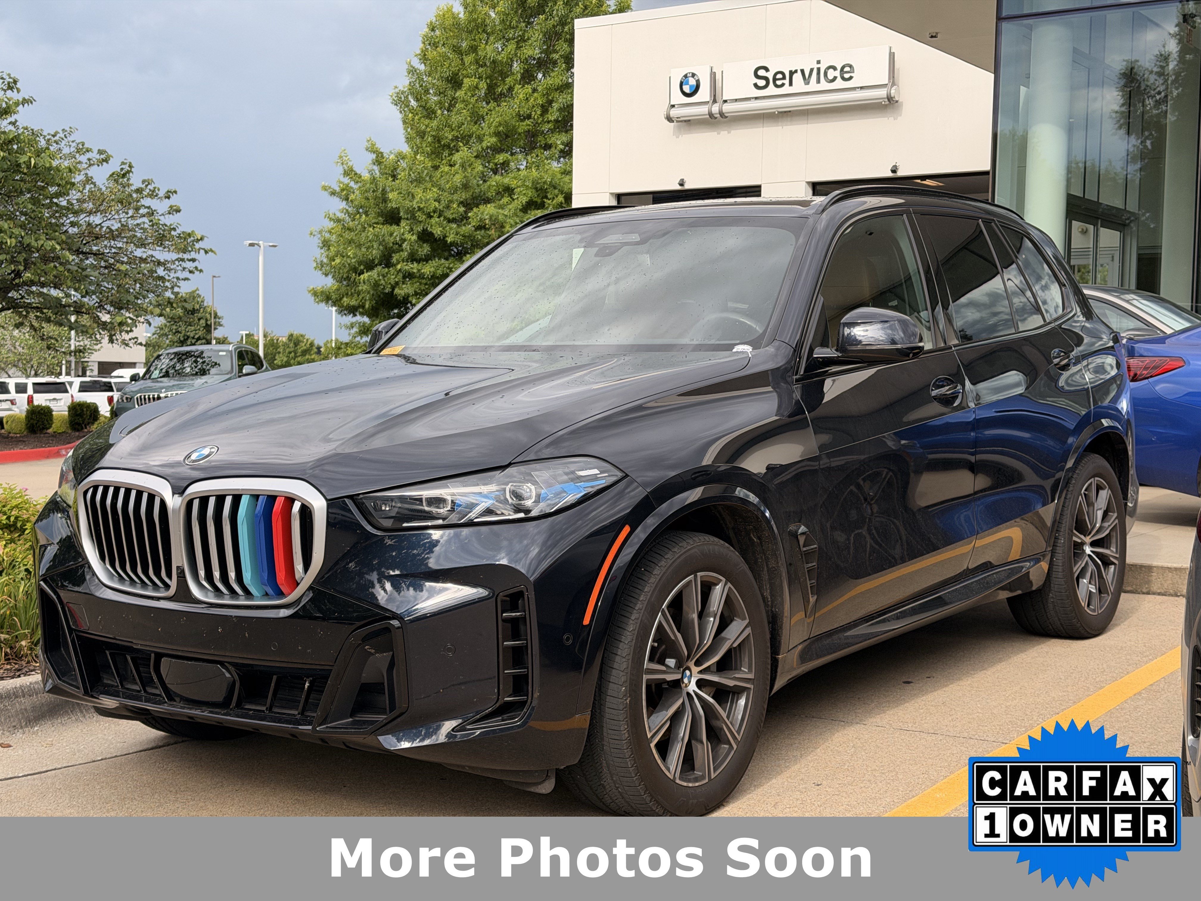 Certified Used 2025 Carbon Black Metallic BMW xDrive40i image 1