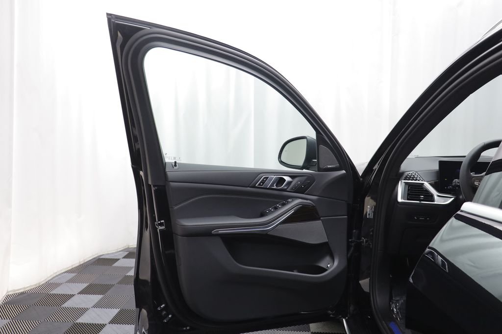 New 2026 Black Sapphire Metallic BMW xDrive50e image 6
