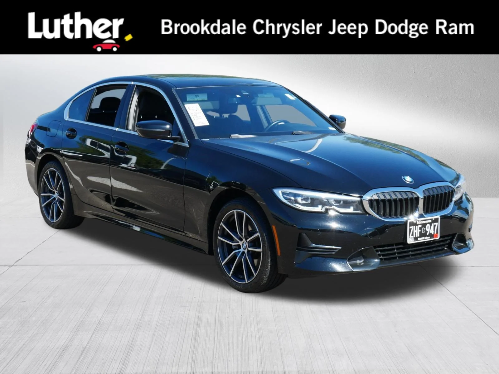 Used 2021 Jet Black BMW 330i xDrive image 1