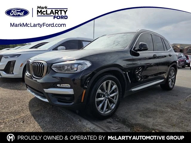 Used 2019 Black BMW sDrive30i image 1