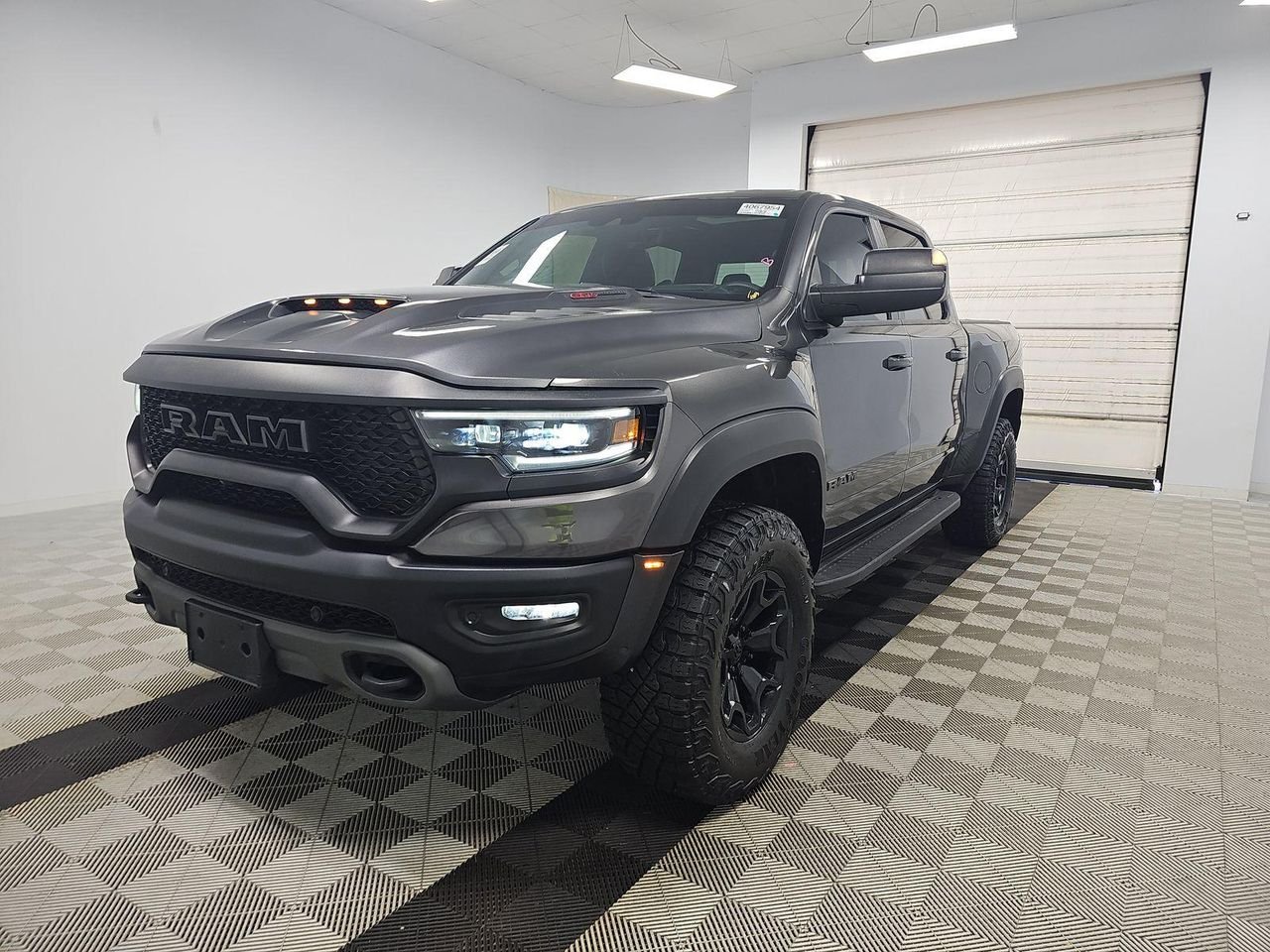 Used 2021 GRANITE CRYSTAL METALLIC CLEARCOAT RAM TRX image 1