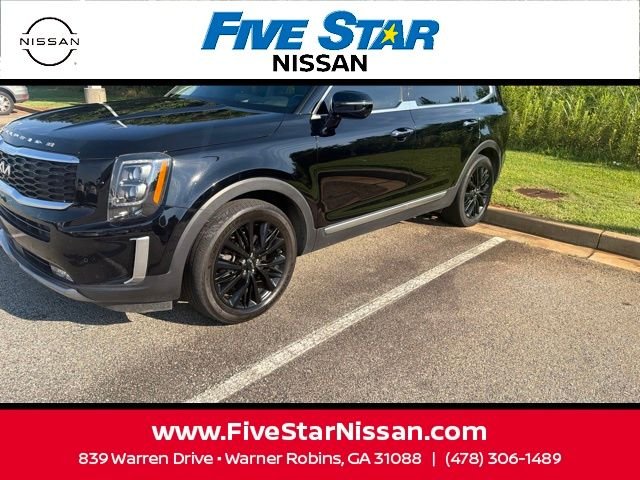 Used 2022 Black Kia SX image 1