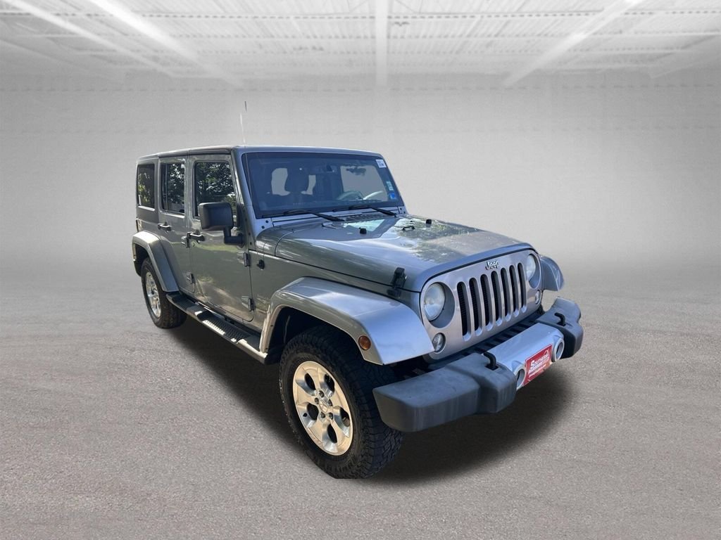 Used 2014 Gray Jeep Unlimited Sahara image 3