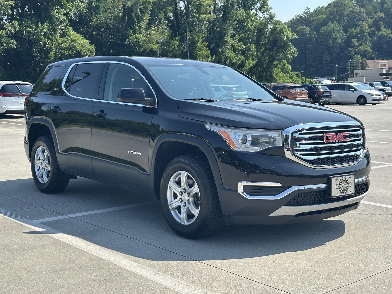 Used 2019 Ebony Twilight Metallic GMC SLE image 1