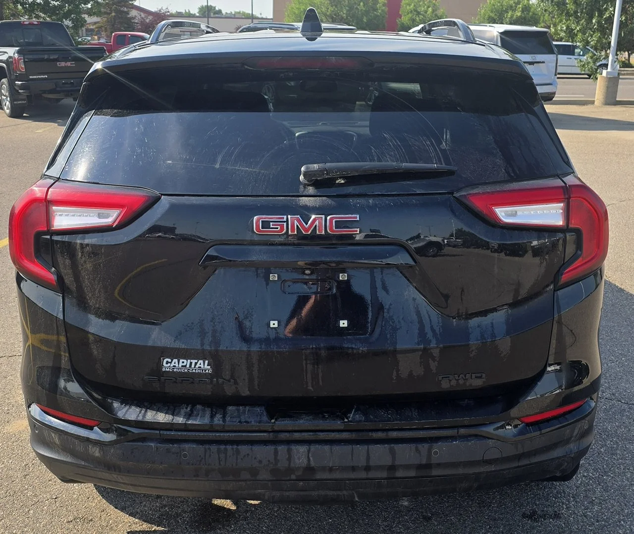 Used 2024 Black GMC SLE AWD image 4