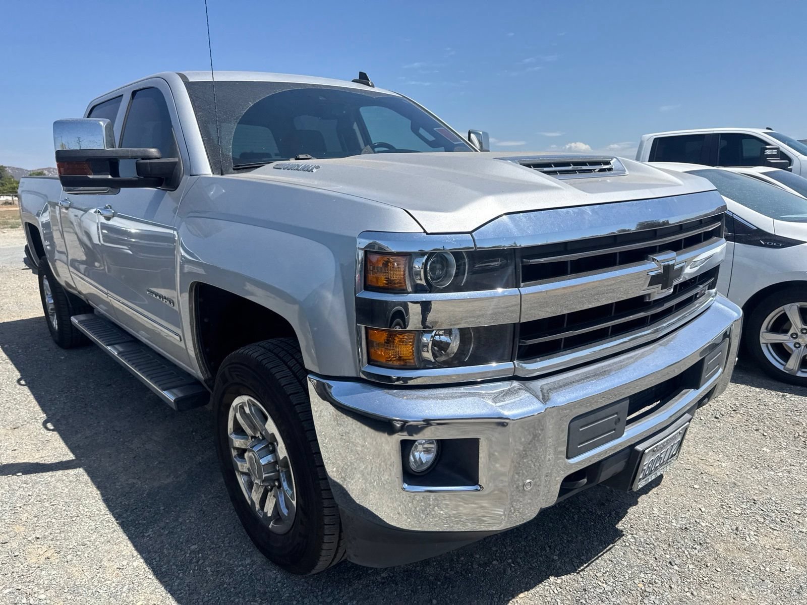 Used 2019 SILVER ICE METALLIC Chevrolet LTZ image 1
