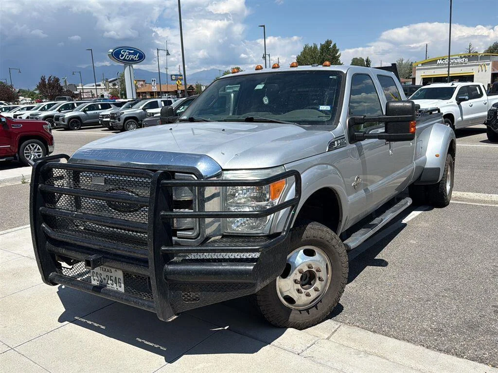 Used 2014 Ingot Silver Metallic Ford Lariat image 1
