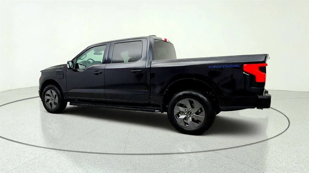 Used 2023 Agate Black Metallic Ford XLT 4WD SuperCrew 5.5