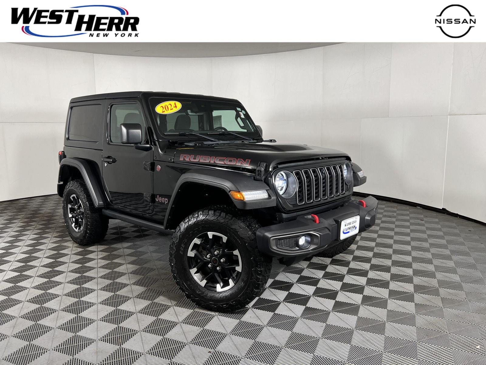 Used 2024 Black Clearcoat Jeep Rubicon image 1