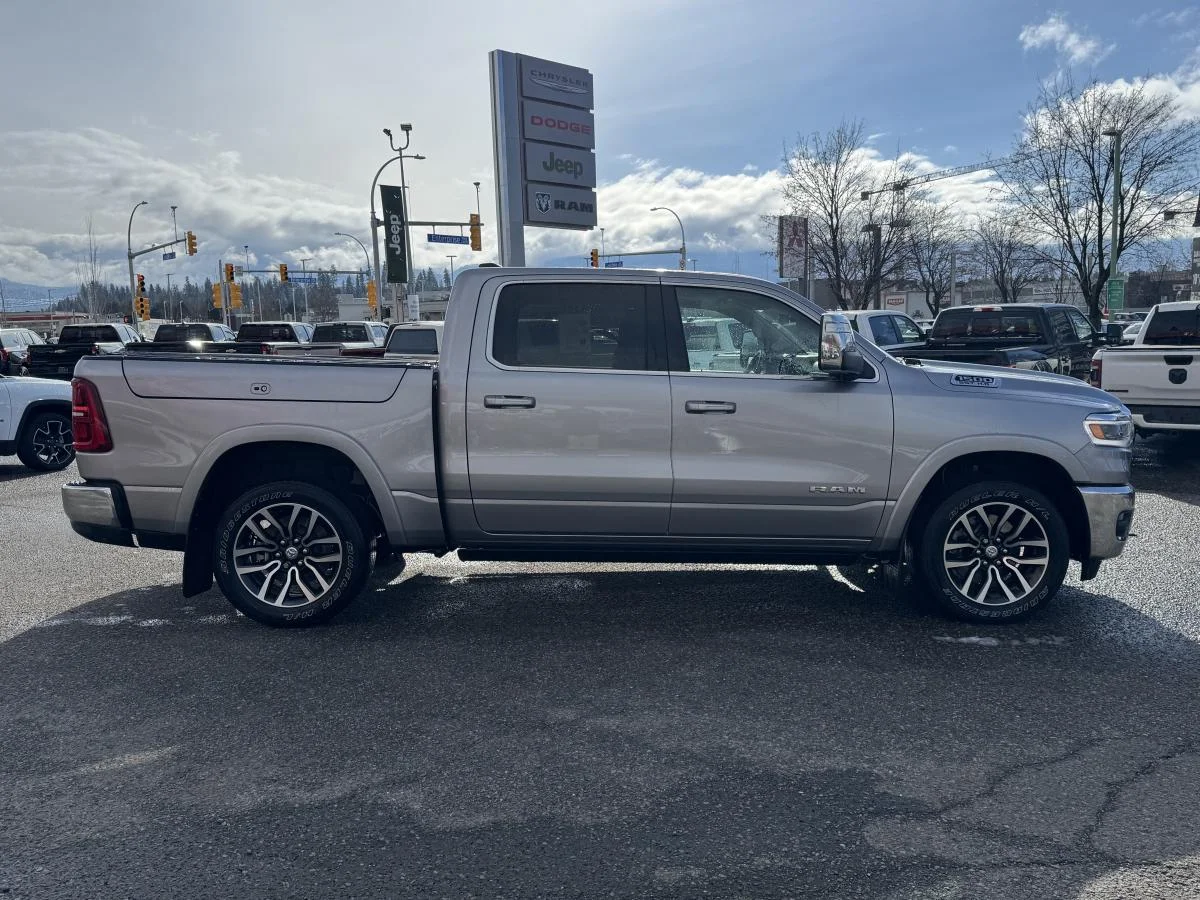 Used 2025 Silver RAM Limited Longhorn 4x4 Crew Cab 5