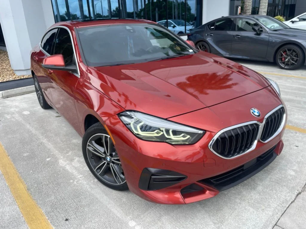 Used 2024 Sunset Orange Metallic BMW 228i image 1