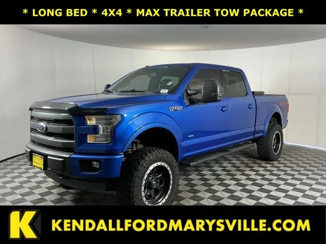 Used 2015 Blue Ford Lariat image 1