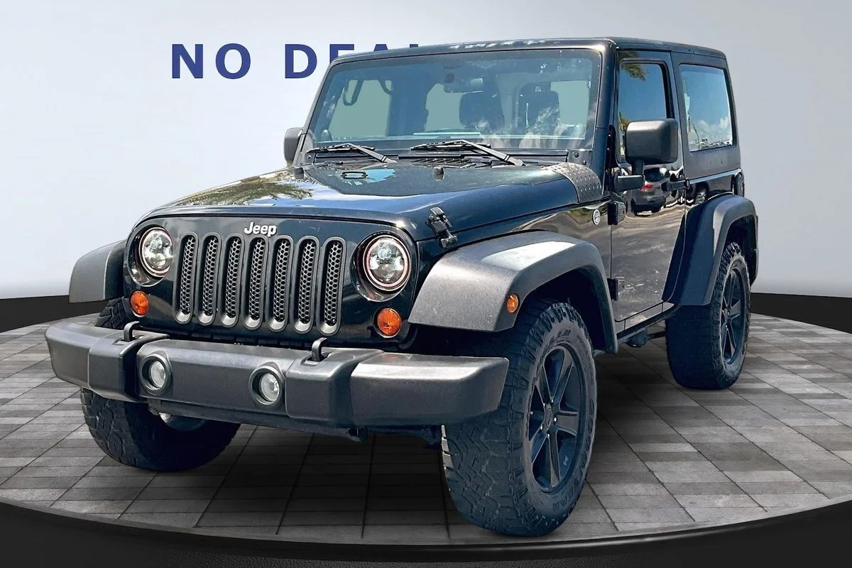 Used 2012  Jeep Sport image 1