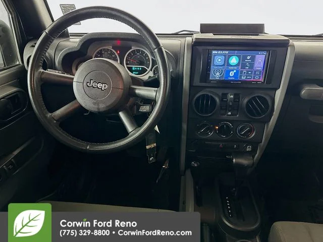 Used 2010 Black Clearcoat Jeep Unlimited Sport image 19