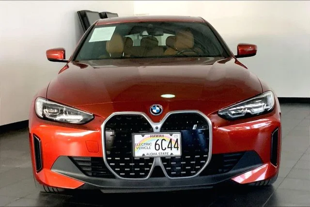 Used 2023 Sunset Orange Metallic BMW eDrive35 image 3