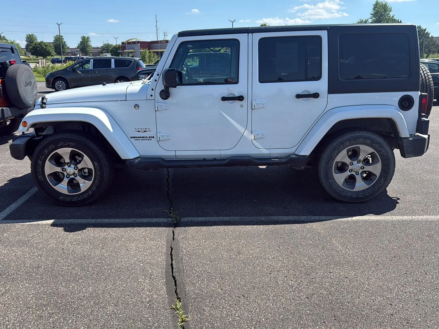 Used 2017 Jeep Wrangler Unlimited Sahara with VIN 1C4BJWEG2HL659299 for sale in Waconia, Minnesota