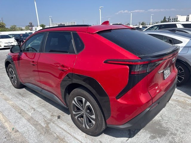 Used 2023 Supersonic Red Toyota XLE image 2