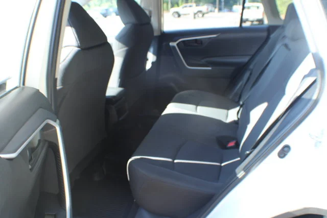 Used 2021 Super White Toyota LE image 13